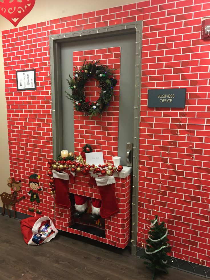 a red brick wall decorated with christmas decorations