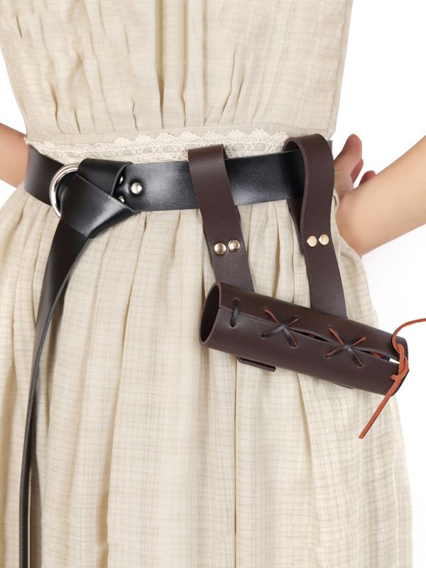 a woman is wearing a belt with leather straps