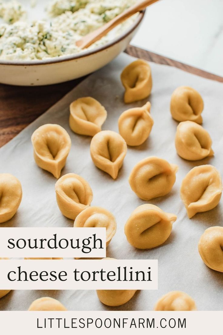 some food is laying out on top of a table with the words sourdough cheese tortelli