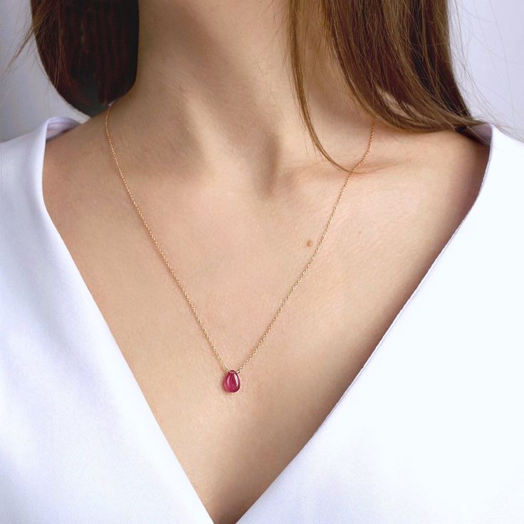 "Genuine Pink Sapphire Pendant Necklace, Simple, genuine, handmade by BoutiqueBaltique. These sapphires have very bright color, very close to pink ruby. Matching earrings: https://etsy.me/2lYntmt MATERIALS: * natural pink sapphire * metal of your choice: ✔ 14k Gold Filled (Yellow or Rose) ✔ Sterling Silver ✔ 14k Solid Gold (without stones at the clasp) * spring-ring clasp closure * beautiful branded gift box + card about pink sapphire SIZE: * pink sapphire: 11-12 mm * chain lengths: 16\" or 18\" Pink Ruby Necklace Fine Jewelry, Rose Gold Ruby Birthstone Necklace, Rose Gold Pink Sapphire Necklaces Gift, Rose Gold Pink Sapphire Necklace For Gift, Pink Sapphire Gemstone Jewelry Gift, Rose Gold Teardrop Ruby Jewelry, Rose Gold Ruby Necklace For Gift, Pink Ruby Necklace For Gift, Pink Sapphire Pendant Necklace As Gift