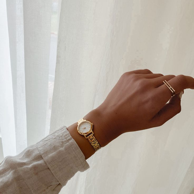 The Manhattan Gold and White Watch + 14K Gold ILU Ring  Shop the look here: https://foursixty.com/icelink/187122685/ #watch #gold #dainty #IceLink White Gold Watches Women, Gold Watch Accessories, Watch Women's Classy Gold, Gold Minimalist Watch, Tiny Watches Women Gold, Small Gold Watch Aesthetic, Women’s Dainty Gold Watch, Classic Gold Watch Women, Watches Women Dainty