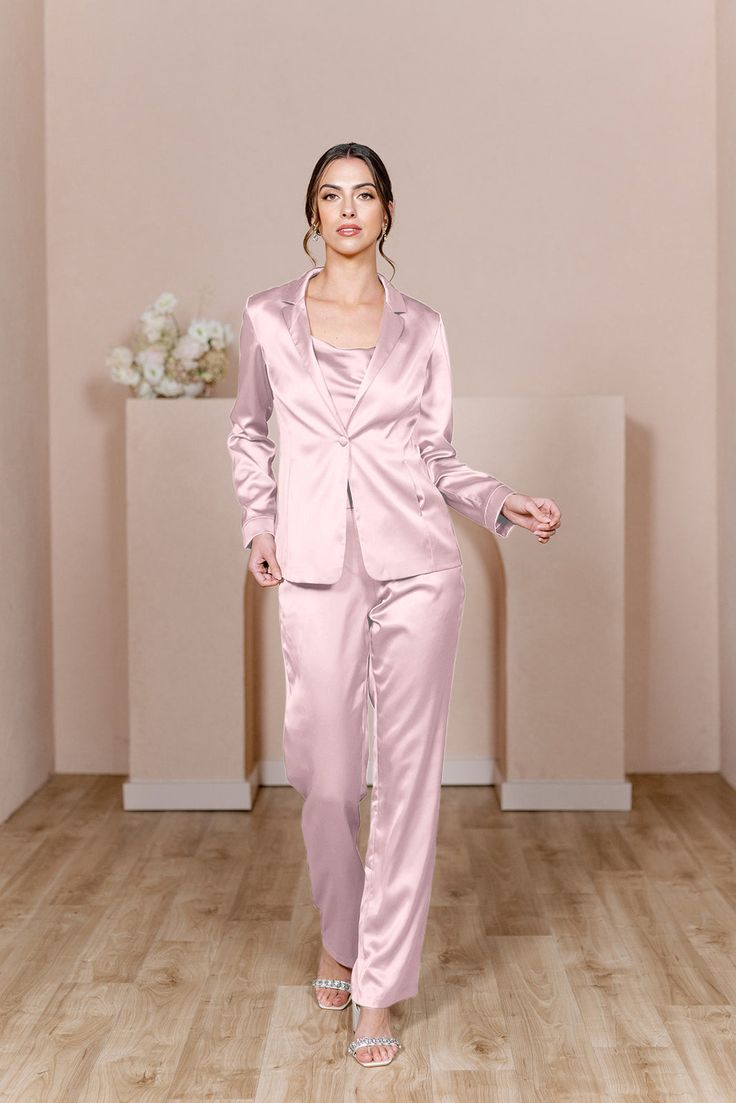 For the bridesmaid that doesn't want a dress, we have you covered! The new Ruby Satin Jacket & Pants set provides a glamorous alternative to a dress and will still have you feeling chic, confident, and comfortable all night long! The Ruby Jacket and Ruby Pants are sold separately. Lindsey size 4, pictured with the Flynn Satin Top in Desert Rose, sold separately. Laken size 24, pictured with the Heidi Chiffon Top in White Pearl, sold separately. FEATURES: Fitted Pants silhouette Side zipper Full- Pink Suits Women, Pants Silhouette, Jacket Silhouette, Bridesmaid Satin, Wedding Parties Colors, Fitted Pants, Satin Jacket, Fitted Jacket, Bridesmaid Dress Colors