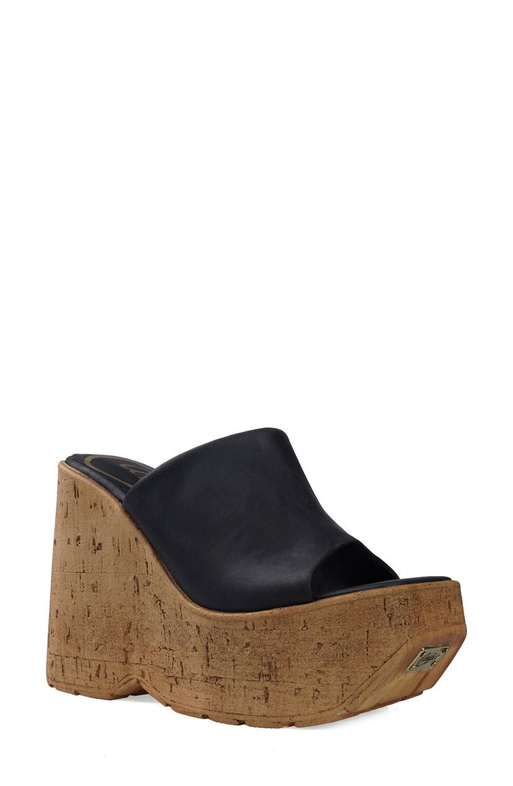 A cork-textured wedge heel adds textural edge to an old-school sandal topped with a smooth leather strap. 5" heel; 2" platform Leather upper and lining/synthetic sole Imported Casual Cork Platform Wedge Sandals, Summer Platform Heels With Cork Material, Open Toe Cork Wedge Sandals With Platform, Cork Platform Heels, Cork Wedge Heels With Platform, Cork Platform Wedge Heels, Summer Cork Platform Heels, Cork Platform Heels With Open Toe, Platform Cork Wedge Heels