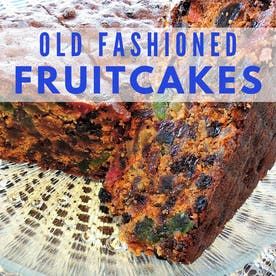 old fashioned fruitcakes on a glass plate with the words, old fashioned fruit cakes