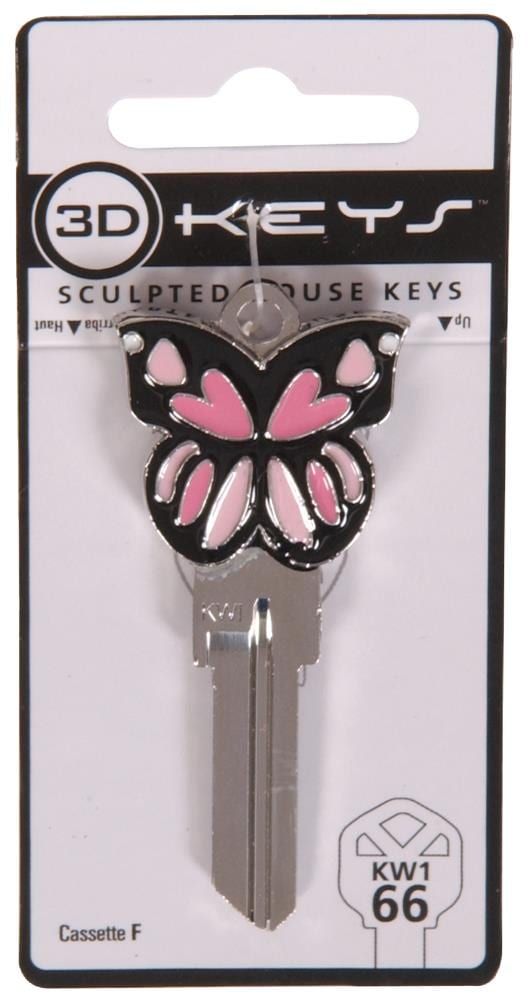 a butterfly shaped key with pink and black butterflies on the front, in a package