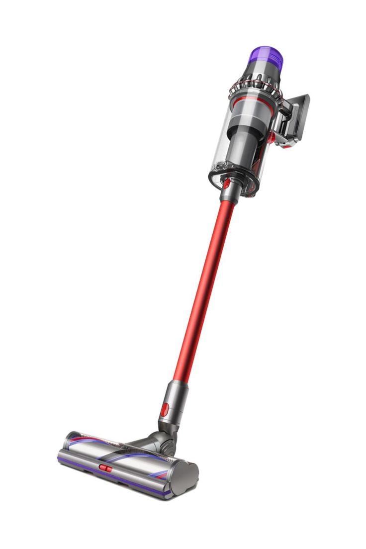 a red and silver vacuum cleaner on a white background with clippings to the side