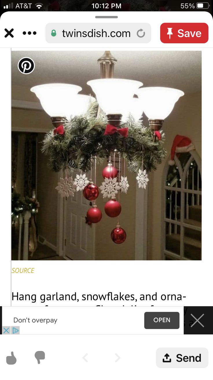 an image of christmas decorations hanging from the ceiling