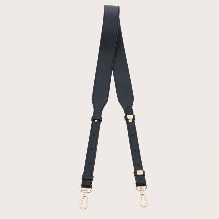 Classic Black Vegan Leather And Gold Hardware Bag Strap. This Strap Is Perfect For Making Any Wristlet With Gold Hardware A Crossbody Handbag. Questions? Leave A Comment Below! *All Items Come From A Smoke Free/ Pet Free Home And Are Stored Safely In Totes Until Shipped. Offers Are Welcomed New To Poshmark? Get $10 With The Code: Houseofpenelope Classic Black Bags As Fashion Accessory, Classic Black Bag As Fashion Accessory, Modern Black Bag Strap For Everyday, Chic Black Shoulder Strap With Detachable Feature, Classic Black Bags, Chic Black Detachable Shoulder Strap, Black Logo Strap For Everyday Bags, Everyday Black Bag Strap With Logo, Black Leather Shoulder Strap For Travel