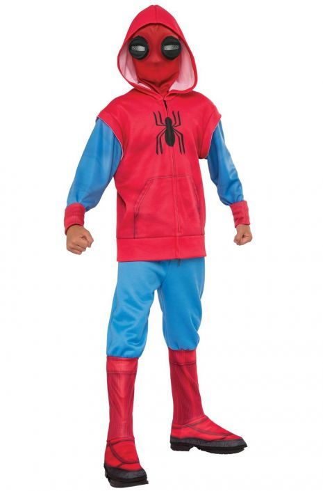 a child in a spiderman costume standing with his hands on his hips and eyes closed