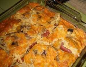 a casserole dish with meat and cheese on it