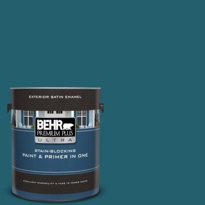 a green paint with the words behr premium plus ultra in white lettering on it