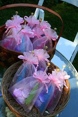 three baskets filled with soap on top of a table