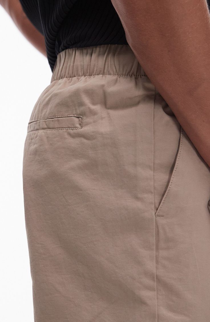 Pure cotton with a hint of stretch keeps you moving comfortably in these tapered pull-on pants that look smart from work to the weekend. 15" leg opening; 13" front rise; 17" back rise Elastic waist Front slant pockets; back welt pockets 98% cotton, 2% elastane Machine wash, line dry Imported Everyday Tapered Leg Bottoms With Pull-on Style, Everyday Bottoms With Tapered Leg And Pull-on Style, Tapered Cotton Bottoms For Workwear, Everyday Pull-on Tapered Leg Bottoms, Casual Tapered Chinos For Work, Spring Tapered Leg Chinos With Elastic Waistband, Everyday Tapered Bottoms With Elastic Waistband, Relaxed Fit Chinos With Tapered Leg And Comfort Waistband, Relaxed Fit Tapered Bottoms For Business Casual