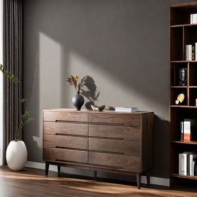 an empty room with a bookcase, vases and other items on the floor