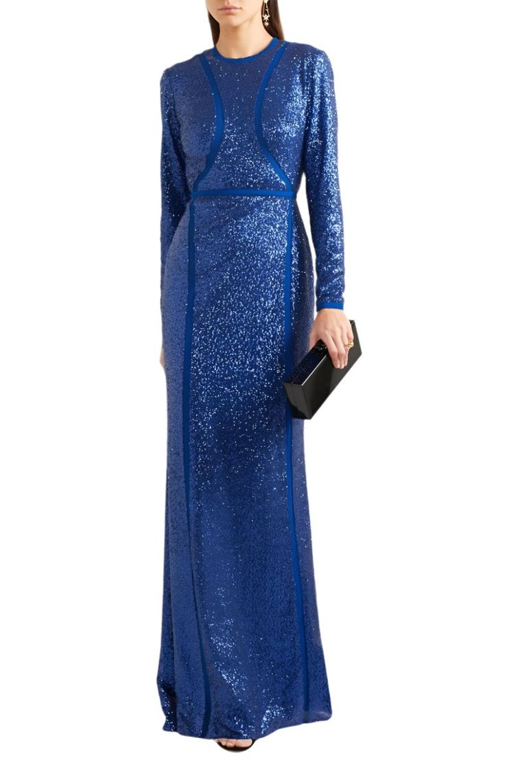 Inspired by oceanic hues and shimmering water, Elie Saab's gown is saturated with 'Pacific Blue' sequins that beautifully catch the light. This silk-blend piece is cut for a close, figure-hugging fit and spliced with tulle panels that are cleverly placed to slim your frame. Wear it to galas, awards ceremonies and formal events with an updo and simple black or metallic accessories. Princess Marie wore the gown in a sleeveless version. This floor length gown clings close to the body. It is crafted Blue Sequined Evening Dress For Wedding, Festive Evening Gown With Contrast Sequin, Blue Sequined Gown For Gala, Festive Contrast Sequin Gown For Gala, Festive Contrast Sequin Gala Gown, Elegant Blue Sequin Fabric For Formal Occasions, Glamorous Blue Gown For Evening, Glamorous Blue Evening Gown, Blue Sequin Fabric For Formal Occasions