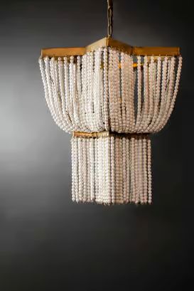 a chandelier with beads hanging from it