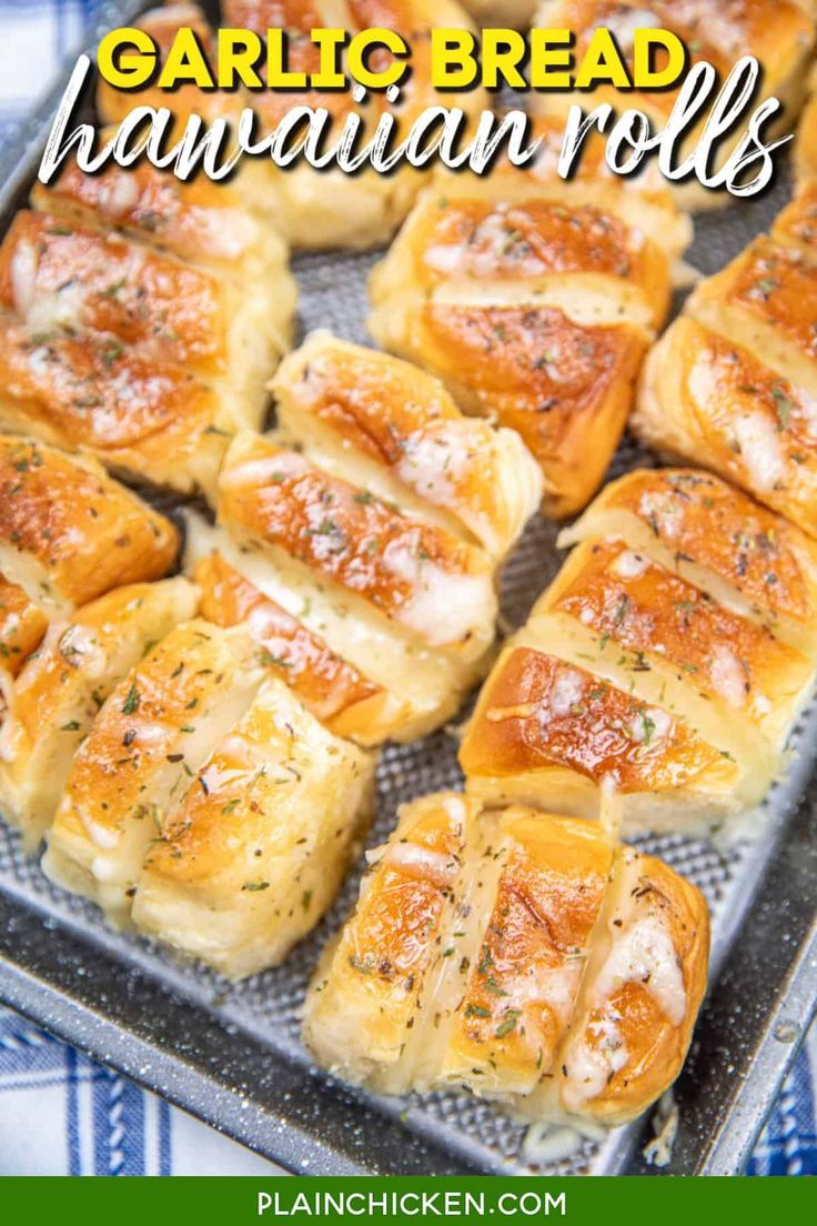 garlic bread hawaiian rolls on a baking sheet with text overlay that reads garlic bread hawaiian rolls