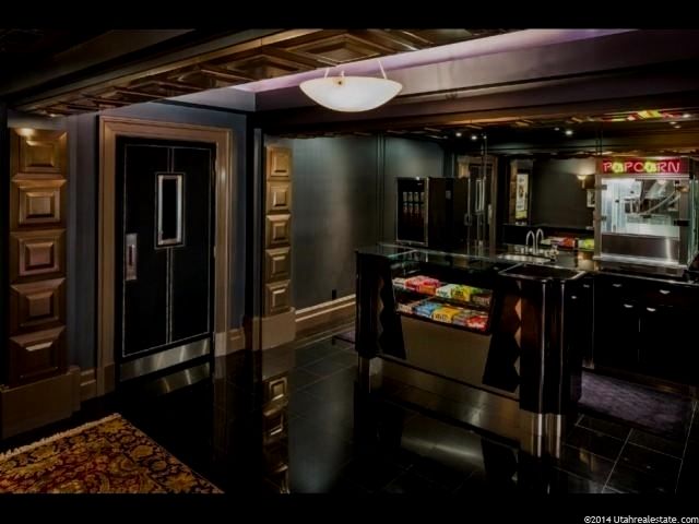 a kitchen with stainless steel appliances and black counter tops