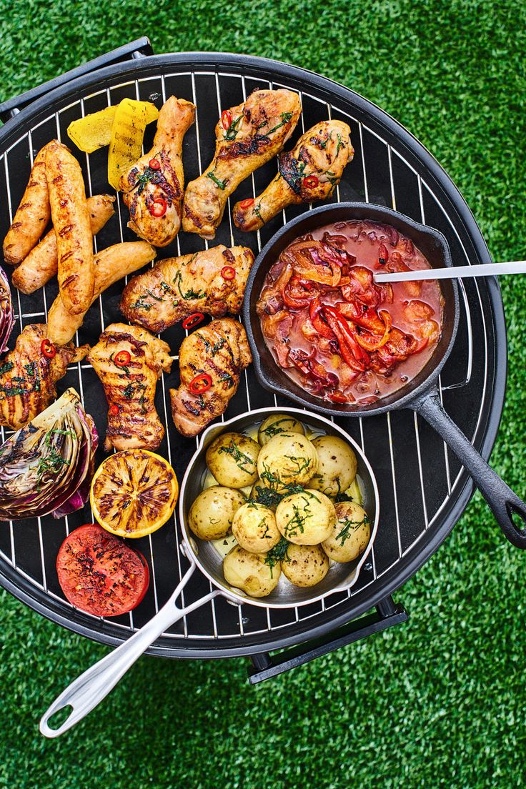 a grill with several different types of food on it