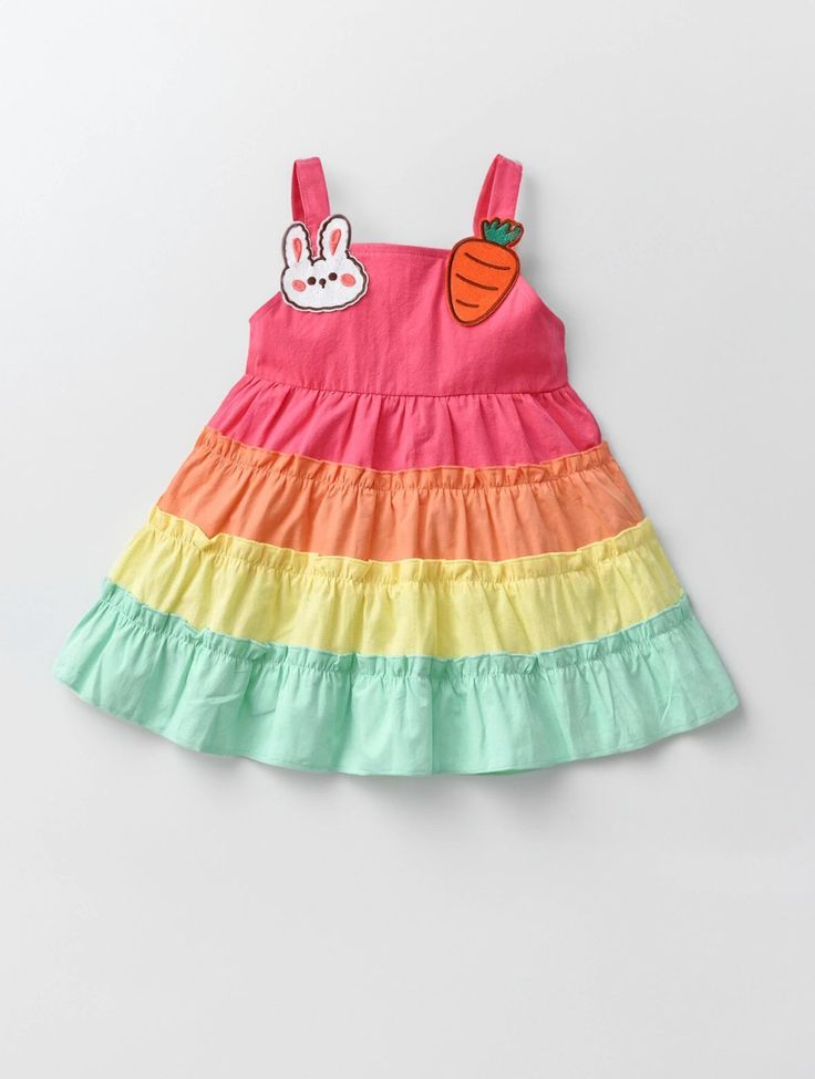 Dress your little one in this charming Baby Girl Rainbow Spring Tiered Dress, perfect for Easter festivities! This adorable dress features vibrant rainbow tiers and playful embroidered rabbits and carrots, adding a touch of whimsy to the holiday. Easter Festivities, Rainbow Springs, Girl Rainbow, Striped Bodysuit, Girls Stripes, Be A Nice Human, Girls Fashion, Tiered Dress