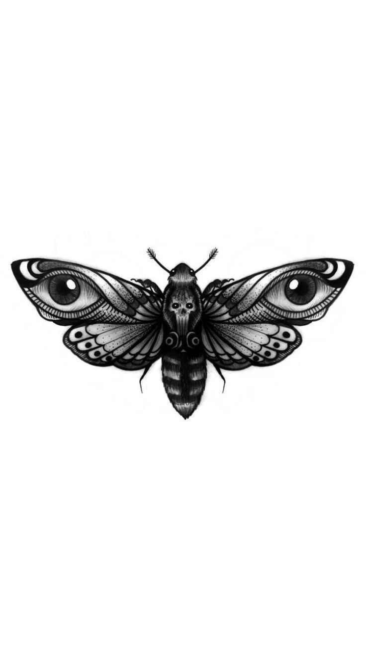 a black and white image of a butterfly with eyes on it's back side