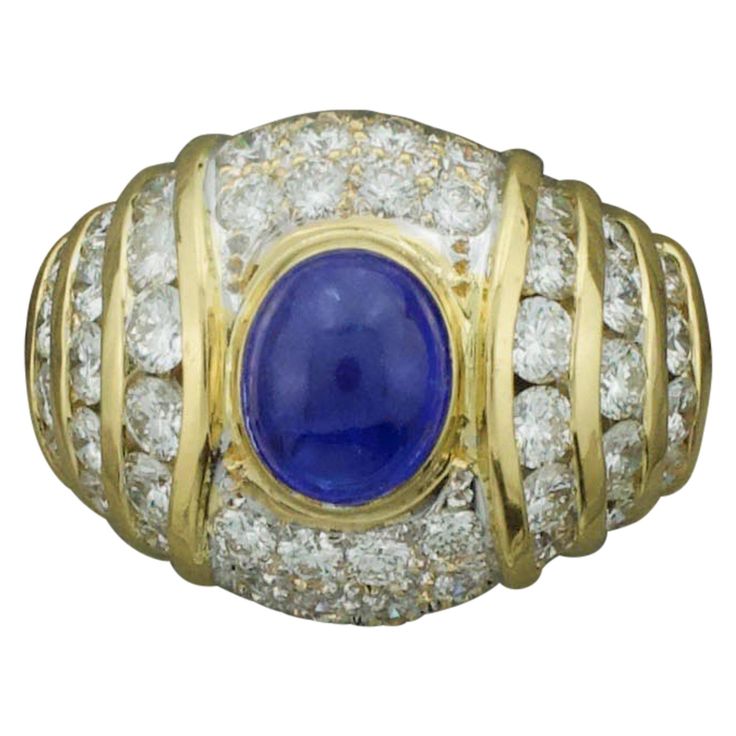 Sapphire and Diamond Fashion Ring in 18k Yellow Gold Circa 1970's One Oval Cabochon Sapphire Weighing 1.75 Carats Approximately [bright with no imperfections visible to the naked eye] Forty Six Round Brilliant Cut Diamonds Weighing 1.70 Carats Approximately [GH VVS Currently Size 6 Can Easily Sized By Us or Your Qualified Jeweler Gold Nugget Jewelry, Sapphire Wedding Rings, Yellow Sapphire Rings, Gold For Sale, Sapphire And Diamond Ring, Diamond Fashion Rings, Sapphire Wedding, Sapphire Diamond Ring, Fashion Ring