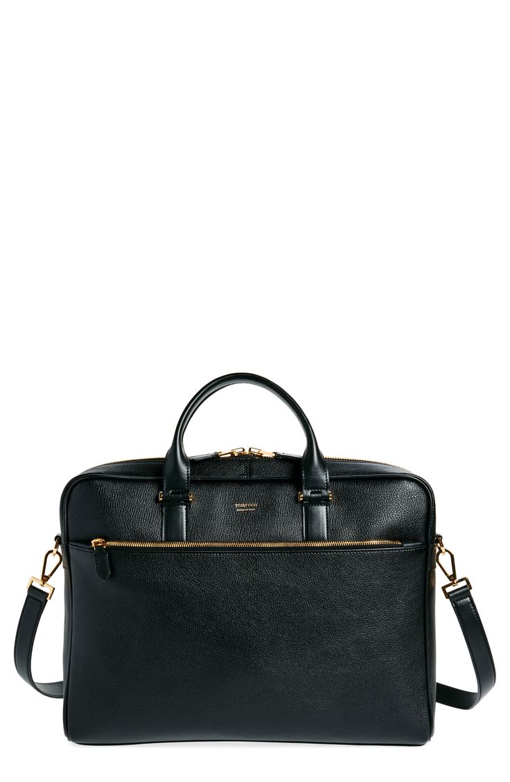 Tom Ford's impeccable craftsmanship elevates your professional repertoire with a richly grained leather briefcase boasting tons of organization features. Two-way top-zip closure Top carry handles; removable, adjustable crossbody strap Front zip pocket; back slip pocket Interior slip pockets; pen loops Textile lining Leather Made in Italy Designer Handbags Saffiano Leather Briefcase With Top Handle For Business, Modern Textured Leather Briefcase For Work, Timeless Briefcase With Gold-tone Hardware For Work, Black Saffiano Leather Briefcase For Work, Modern Office Briefcase With Gold-tone Hardware, Luxury Briefcase With Zipper Closure For Business Trips, Luxury Briefcase With Zipper For Business Trips, Designer Textured Leather Briefcase For Business, Designer Textured Leather Briefcase For Work