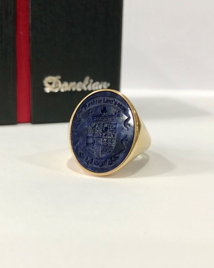 Sodalite Coat of Arms Signet Ring that can be personalized with your desired Family Crest design. A handmade piece that has been brought to life with the combination of fine goldsmith techniques and the latest technology. 📩 Leave us a message with your custom personalization, your family crest, coat of arms, logo or any design imagined. If you would like a different gemstone instead, please contact us. Gemstone Signet Ring - Coat of Arms Ring - Armorial Ring - Wax Seal Ring - Family Crest Ring Classic Oval Hallmarked Enamel Ring, Oval Enamel Gemstone Ring In 14k Gold, Formal Oval Enamel Ring In 14k Gold, 14k Gold Oval Enamel Ring For Formal Occasions, Oval 14k Gold Enamel Ring For Formal Occasions, Formal Oval 14k Gold Enamel Ring, Classic Oval Enamel Ring For Gift, Luxury Oval Enamel Ring For Gifts, Luxury Polished Opal Ring For Gift