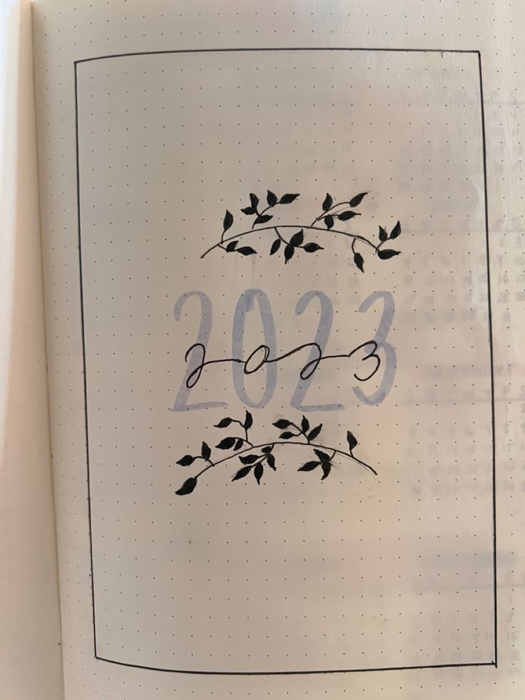 a page in a notebook with the year 2013 written on it and an image of leaves