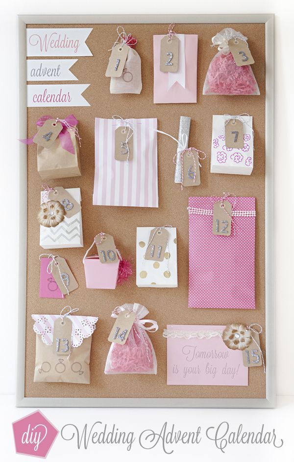 a cork board with lots of different items attached to it and some tags hanging on the wall