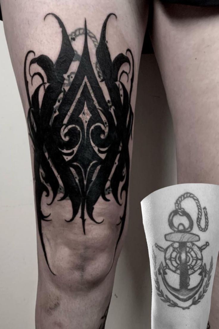 the legs are decorated with black ink and an anchor