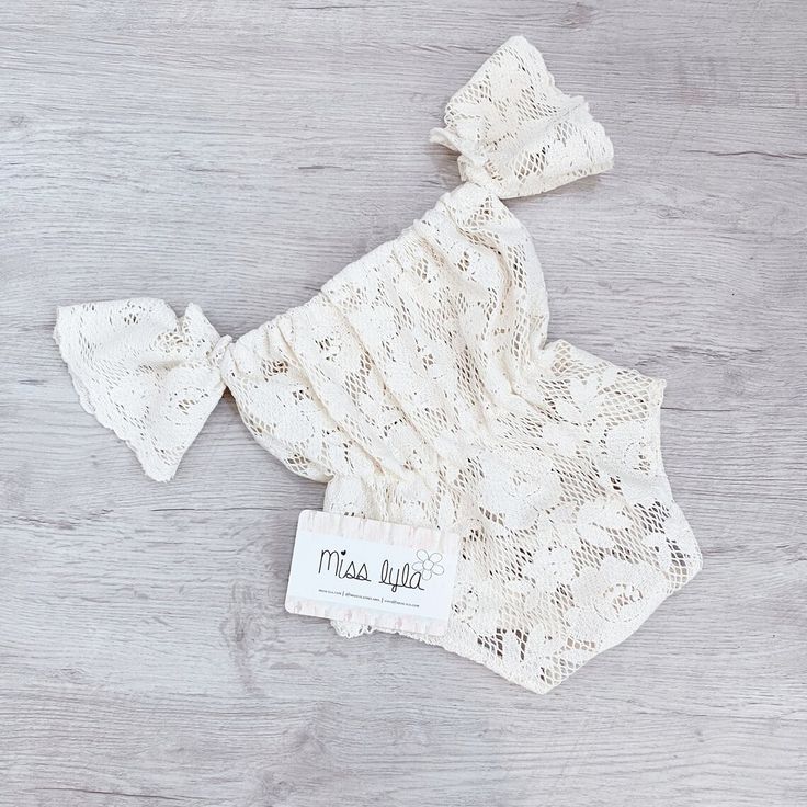 A beautiful kiaan boho beige romper 100% cotton. Featuring off the shoulder style. Perfectly shaped waist with stretchy elastic. This beautiful romper is just perfect for those summer beach days.
** Not Lined **
** Listing is for the romper and headband. **
 
♡ GORGEOUS HANDMADE ITEMS FOR YOUR LITTLE MISS. ( Size 0000 - 5 years.)
♡ This is item is made to order.
♡ Fabric pattern placement and shape may be different than to images shown.
♡ WASHING CARE -We highly recommend hand washing this item to maintain its quality life, though it has been tried and tested in a machine wash, ensuring you use a wash mesh bag on gentle cycle. Cream Short Sleeve Bubble Romper For Summer, Cream Bubble Romper For Beach In Summer, Cream Bubble Romper For Beach And Summer, Beige Bubble Romper With Ruffles For Summer, White Summer Bubble Romper For Beach, Summer Beige Bubble Romper With Ruffles, Beige Ruffled Bubble Romper For Summer, Beige Cotton Bubble Romper For Summer, Summer Beige Cotton Bubble Romper