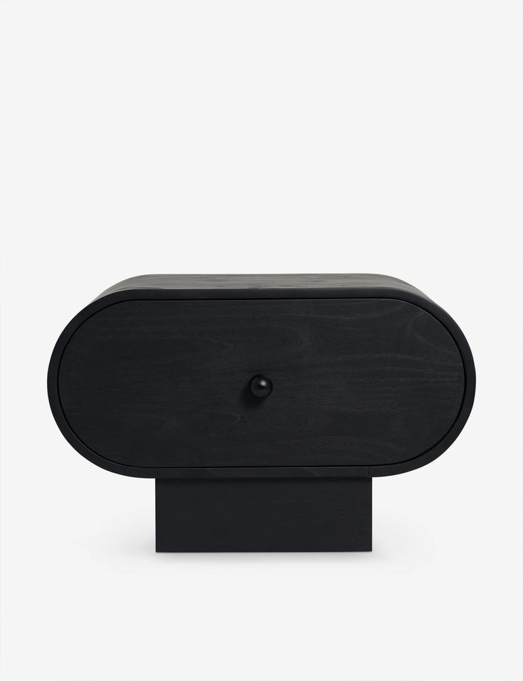 a black table with a wooden base