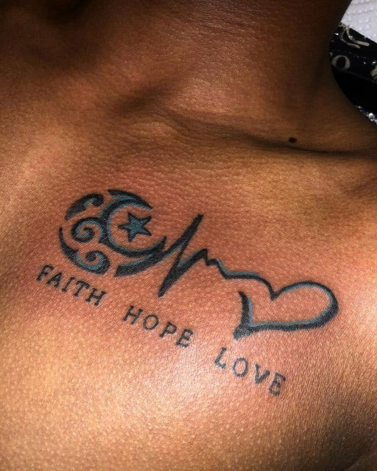 a woman's chest with a heart and the words faith hope written on it