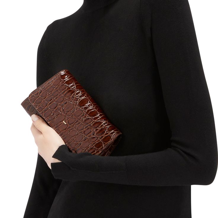 Crocodile-print leather clutch bag with metal detail, chain shoulder strap, pocket and inner card slots. Elegant Rectangular Clutch With Card Slots, Luxury Wallet On Chain For Workwear, Luxury Clutch For Work, Elegant Formal Wallet On Chain With Card Slots, Elegant Formal Wallet With Card Slots, Chic Wallet On Chain With Card Slots, Elegant Leather Clutch With Card Slots, Elegant Clutch With Card Slots, Chic Evening Clutch With Card Slots