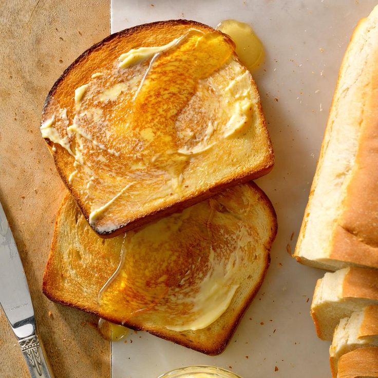 two slices of french toast with butter on them