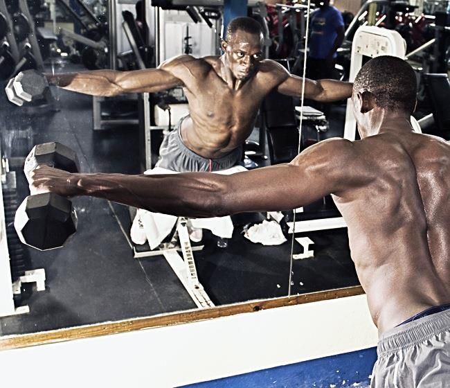 two men working out in a gym