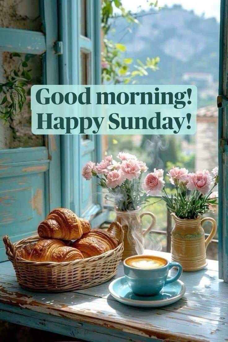 a cup of coffee and some croissants on a window sill with the words good morning happy sunday