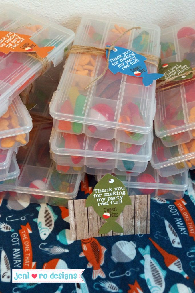 several plastic containers filled with different colored candies