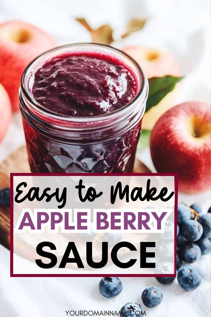 an apple and blueberry sauce in a mason jar with the words, easy to make apple berry sauce