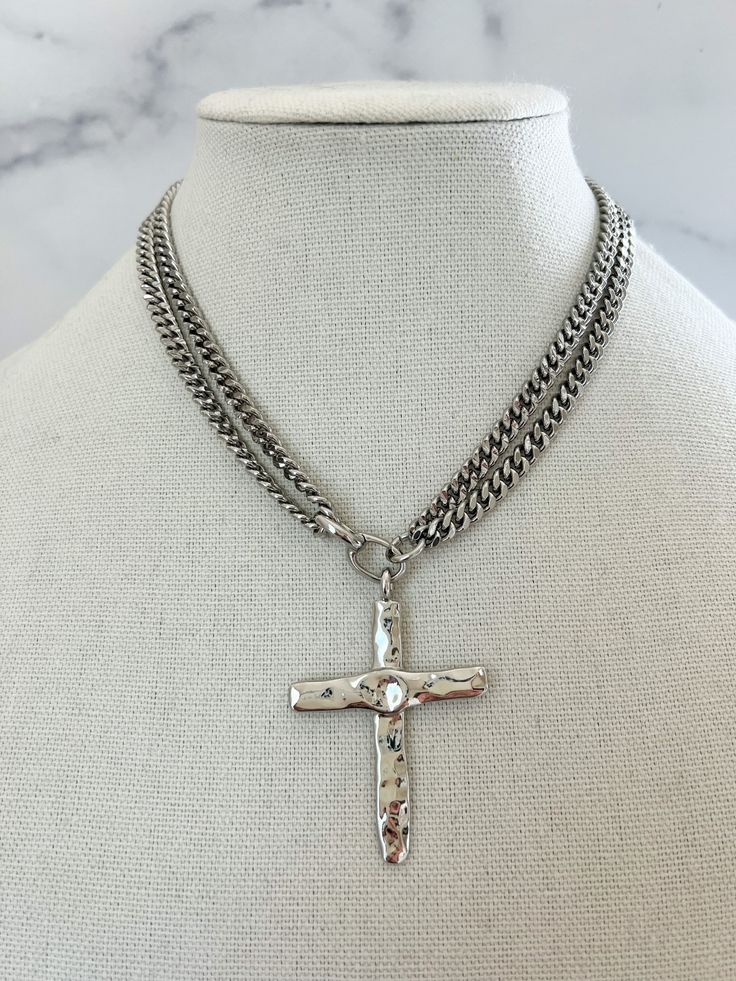 Silver Cross Necklace this is a head turner! This necklace is made with a double cuban chain linked - dressed with a silver (rhodium) plated large cross pendant. Comes in various lengths! We love to wear this alone or pair it with one or more chains alike for a layered look!  Details:  + silver (rhodium) chain and cross pendant  + Nickel Free  + Hypoallergenic  + Sold as 1 Necklace  Measurements:  + Various Lengths  + Pendant Length: 1.7 Inches + Pendant Height : 2.4 Inches  Please contact us wi Silver Cross Curb Chain Necklace, Silver Curb Chain Necklace With Cross Pendant, Silver Cross Necklace With Figaro Chain, Silver Cross Necklace With Curb Chain, Silver Cross Chain Necklace With Curb Chain, Silver Crucifix Figaro Chain Jewelry, Silver Crucifix Necklace With Figaro Chain, Silver Figaro Chain Necklace With Cross Pendant, Metal Cross Chain Necklace