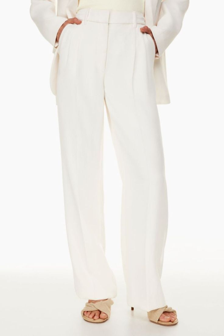 These tailored comfortable wide-leg pants are adorned with front knife pleats, easy drape, and a long, wide leg. The unique functional waistband of the wide-leg pants give you long-lasting wear and plenty of stretch to ensure all-day comfort.Easy to mix and match with boots or high heels, a sweater and suit jacket, a shirt top and more. They go amazingly well with booties or heels, a crop top, and a tight jacket for the perfect attire. Available in a variety of fun colors like Mocha, Black, Beig Effortless Pant, Crepe Trousers, Knife Pleats, Flattering Pants, High Waisted Wide Leg Pants, New Pant, High Rise Pants, Romper With Skirt, Crepe Fabric