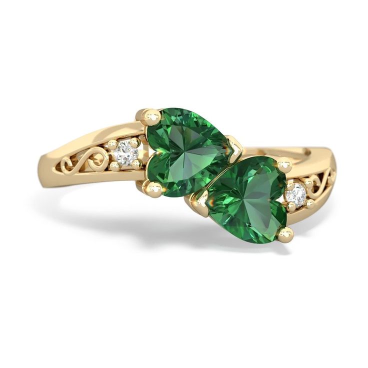 Two hearts, snuggled up against each other, in a warming 14K Gold embrace. This ring features beautiful heart shaped lab emerald and lab emerald gems. Accented by two dazzling diamonds, with an elegant filigree curve. You can customize this ring, perhaps choosing your loved one's favorite colors, or the birthstones of you and your love. Gem: Lab Created Emerald Metal: solid 14K Gold Diamonds: genuine SI2 diamonds Free gift packaging is included with every order. Heart Cut Emerald Ring For May Birthstone, Heart Cut Emerald Promise Ring For May Birthstone, Green Heart Ring For May Birthstone Wedding, Green Heart Ring For Wedding And May Birthstone, May Birthstone Heart Cut Ring, Heart Cut May Birthstone Ring, Green Heart Birthstone Ring For Promise, Green Heart Ring For Promise And May Birthstone, Green Heart Ring For Wedding With May Birthstone