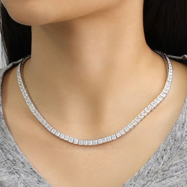 SKU : HBHB14N5004A This Simulated Diamond Necklace, Sterling Silver Necklace for Women Men, Princess CZ Stone Tennis Necklace, Tennis Chain Choker Necklace, 17" is a meticulously crafted and beautiful necklace. Specifications Metal color: 925 Sterling Silver Stone Color: Clear Stone Shape: Princess Stone Size: Available in 3 mm and 4 mm Chain: 17" Material: 925 Sterling Silver Our stones are the highest quality diamond simulants that are polished, finely cut, loupe clean, and have an exactly sim Dazzling Silver Single Strand Jewelry, Classic Box Chain Necklaces For Wedding, Classic Wedding Necklaces With Box Chain, Classic Wedding Box Chain Necklaces, Silver Single Strand Cubic Zirconia Necklace, Dazzling Single Strand Necklace For Gift, Classic Jewelry With Cubic Zirconia Box Chain, White Gold Cubic Zirconia Necklace With Box Chain, White Gold Necklaces With Cubic Zirconia Box Chain