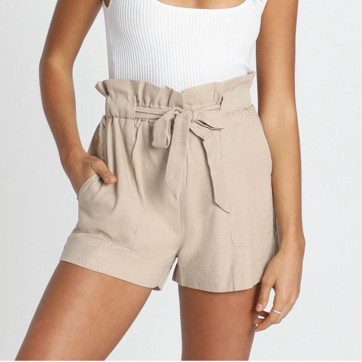 Cute Beige High Waisted, Tie Front Shorts. From Showpo. Elastic Waist, Size Medium. 100% Polyester. I Have 1 Nwt Available & 1 Used In Great Condition Available. Beige Bottoms With Built-in Shorts For Day Out, Paperbag Waist Bottoms With Built-in Shorts For Day Out, Summer Bottoms With Elastic Waistband In Khaki, Beige Paperbag Waist Bottoms With Elastic Waistband, Beige Paperbag Waist Bottoms With Elastic Band, Beige Elastic Waistband Shorts For Summer, Beige Shorts With Elastic Waistband For Summer, Chic Neutral Cotton Shorts, Summer Beige Shorts With Elastic Waistband