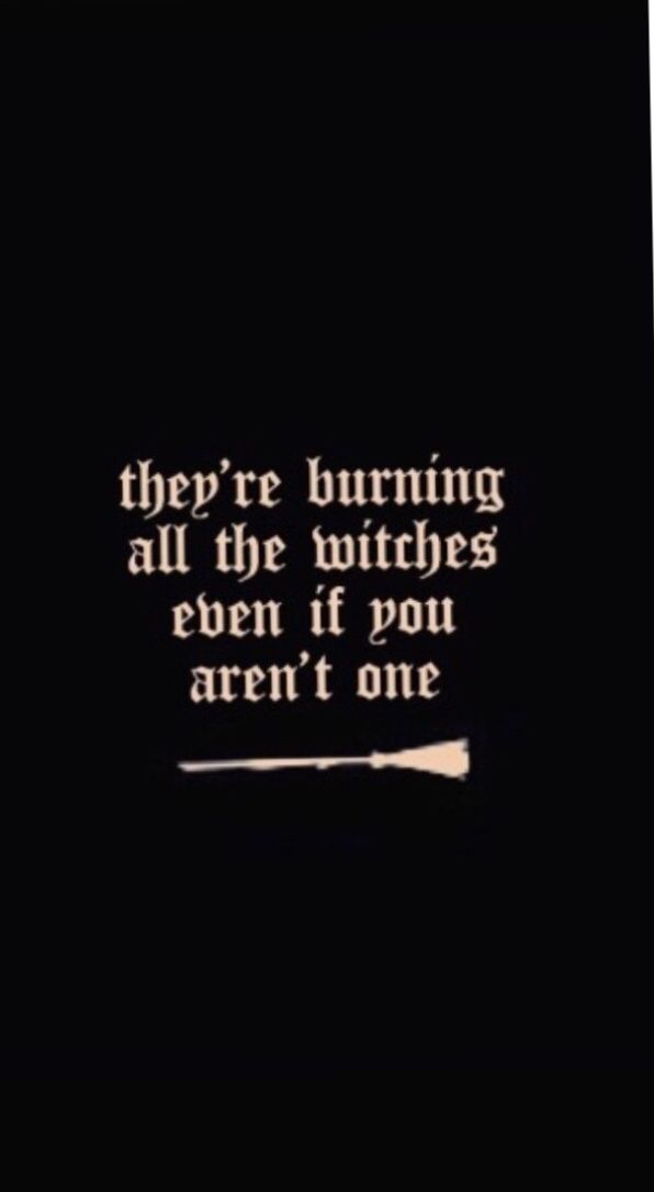 a black and white photo with the words they're burning all the witches even if you aren't one