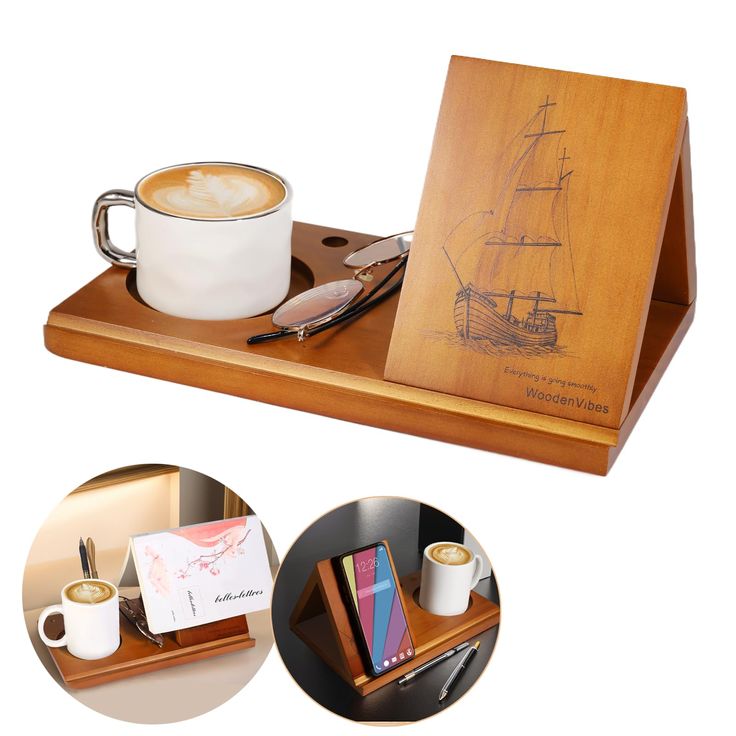 a wooden desk with a cup of coffee on it and a drawing of a ship