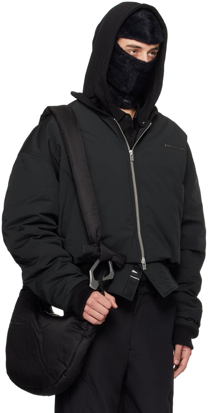 Polyester taffeta bomber jacket. · Detachable hood · Rib knit stand collar, hem, and cuffs · Two-way zip closure · Logo plaque at chest · Welt pockets · Velcro panel at hem Supplier color: Black Heliot Emil, Detachable Hood, Welt Pockets, Welt Pocket, Stand Collar, Rib Knit, Bomber Jacket, Collar, ? Logo