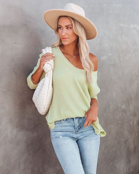 Best Seller Relaxed Fit 64% Polyester. 32% Cotton and 4% Spandex Hand Wash Cold. Dry Flat Rounded V-Neckline Sleeves Rounded Hemline Knit Fabrication No Closures Not Lined //Best Seller// New Color// The Between Us Thermal Knit Top is a fan fave for the season in its comfy lime green hue fit with a rounded v-neckline and long sleeves.Styled with: Rocky Mountain Hat. Gabi Hoops. Chloe Mini Necklace. Mosaic Coin Necklace. Simple Bangle. Harper Handbag. Jeanne Denim. and Shirley Mule.---SIZE A...