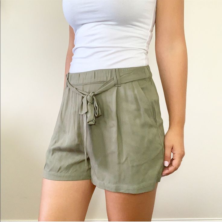 'Campo' Twill Tie Front Shorts By Becool. Elastic Waist. Front Pockets. Size Large In Sage Green New With Tags Length: 15" Waist Across Before Stretch: 15.25" Inseam: 3" 100% Rayon Boutique Spring Summer Fall Birthday Party Celebration Honeymoon Anniversary Shower Casual Weekend Travel Vacation Beach Dinner Date Night Work School City Fashion Summer Versatile Khaki Bottoms, Versatile Green Summer Bottoms, Versatile Khaki Summer Bottoms, Versatile Khaki Bottoms For Summer, Vacation Bottoms With Tie Waist In Short Length, Summer Shorts With Short Inseam, Summer Bottoms With Tie Waist, Versatile Summer Shorts With Short Inseam, Spring Khaki Shorts With Short Inseam